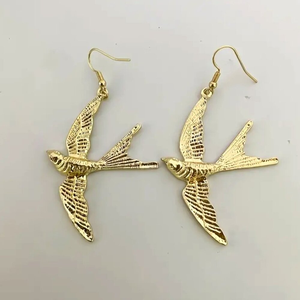 Anthro gold swallows earrings